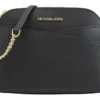 Bolsa Michael Kors Jet Set Travel Dome negra crossbody con herrajes dorados