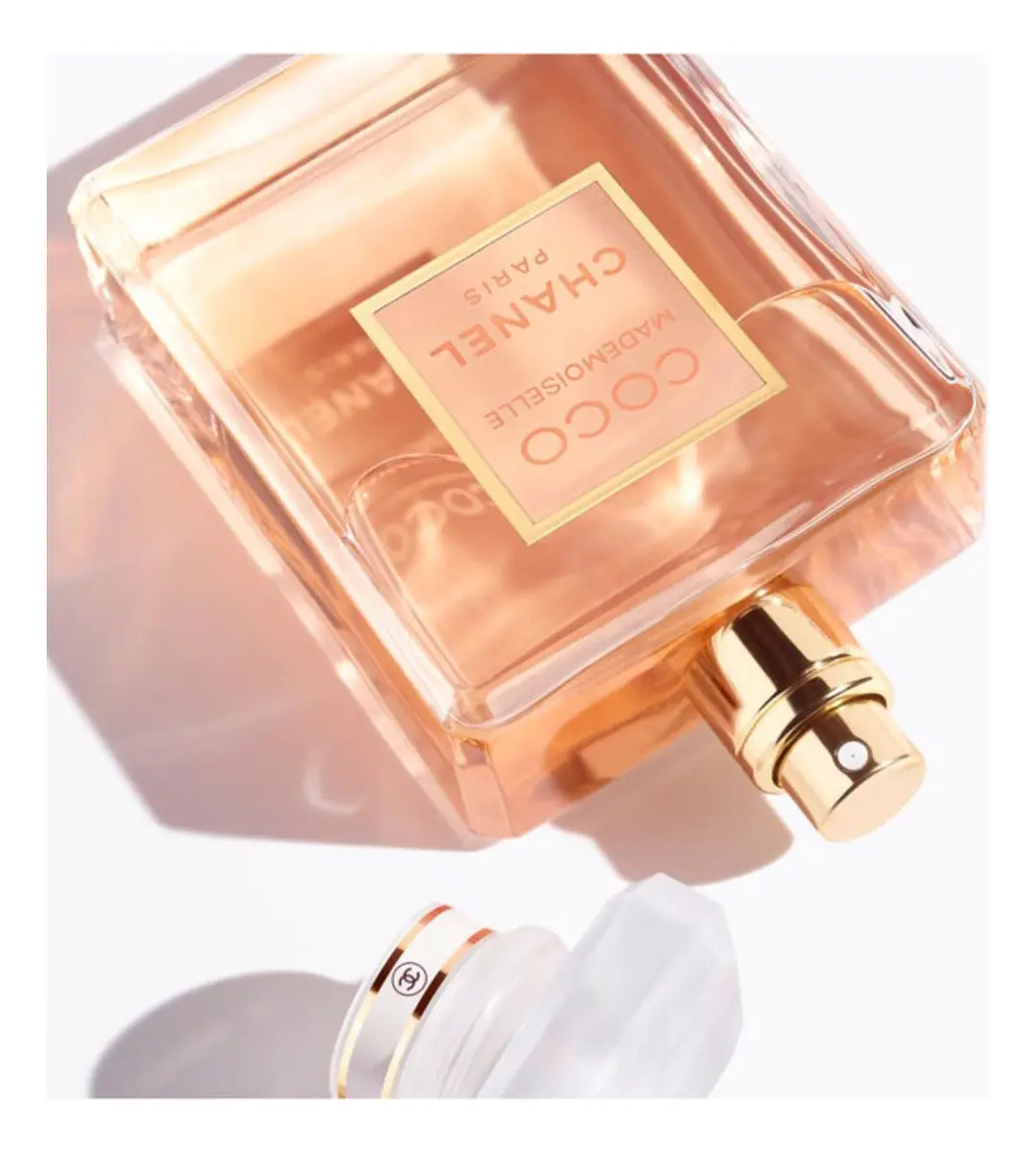 Botella de perfume Coco Mademoiselle Chanel 100ml Eau de Parfum, fragancia cítrica y amaderada para mujer que proyecta libertad y sofisticación