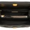 Bolso Tory Burch Fleming negro cuero acolchado con cadena dorada