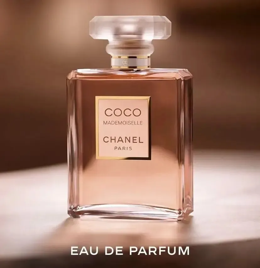 Botella de perfume Coco Mademoiselle Chanel 100ml Eau de Parfum, fragancia cítrica y amaderada para mujer que proyecta libertad y sofisticación