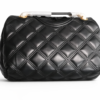 Bolso Tory Burch Fleming negro cuero acolchado con cadena dorada